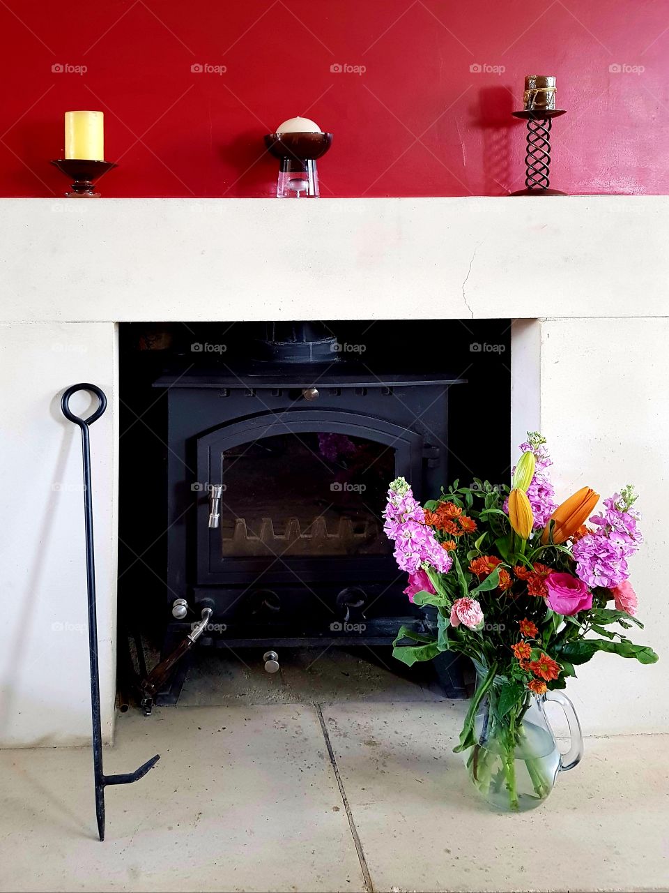 Spring flowers on a fireplace