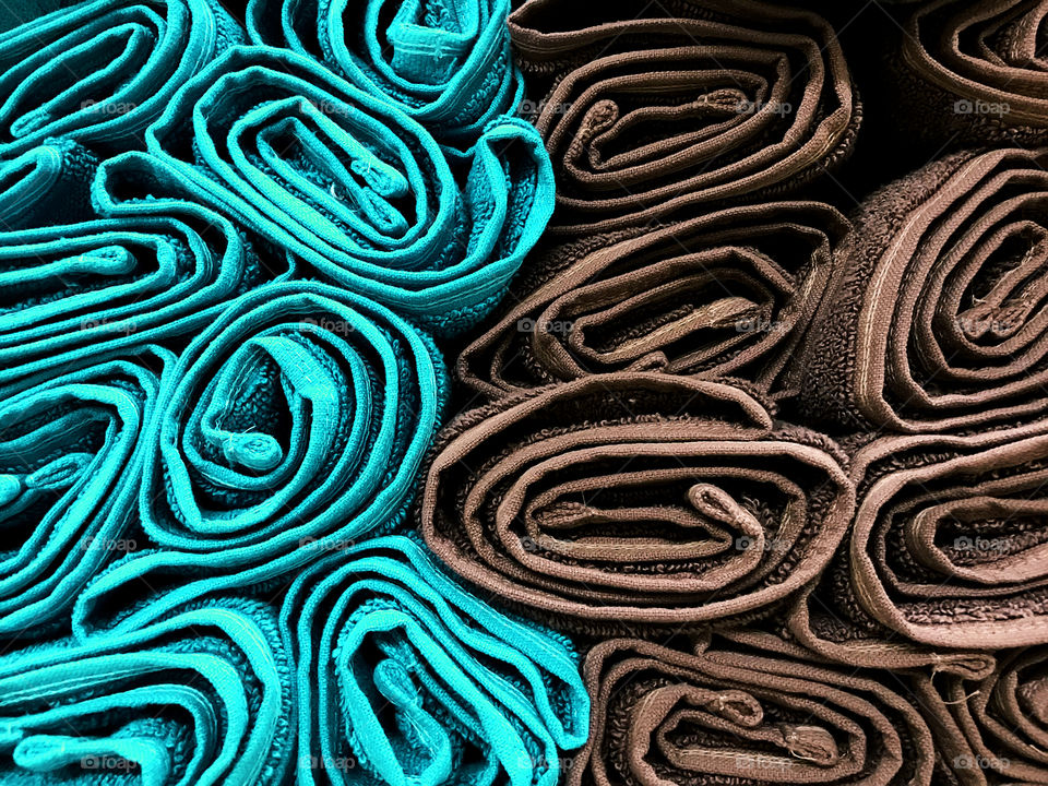 Blue and brown wrapped towels 