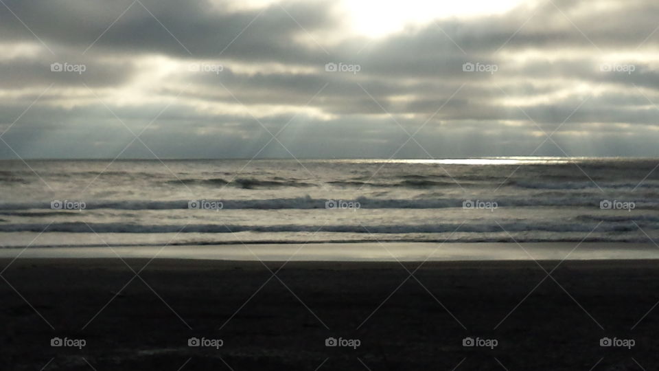 sunset through the clouds