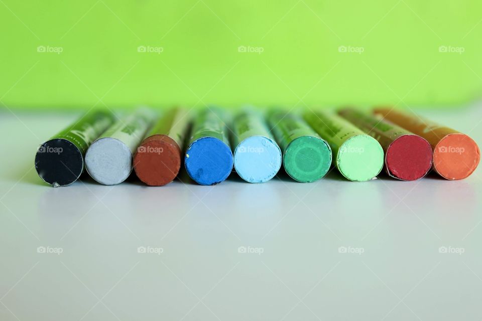 Colored crayons lined up