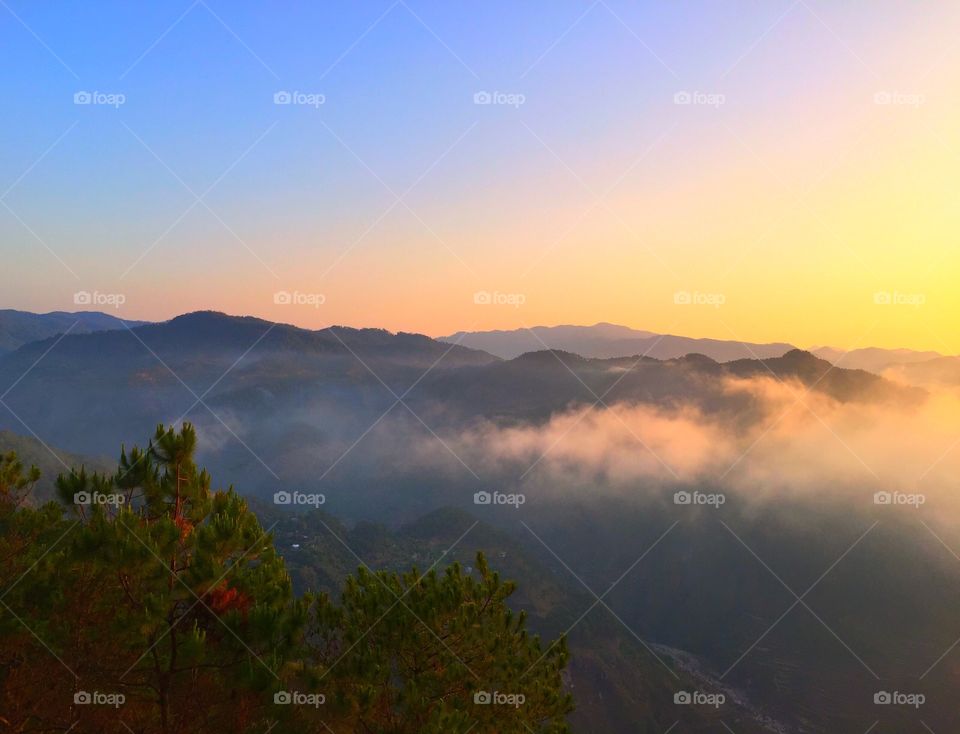View of mountain range at sunrise
