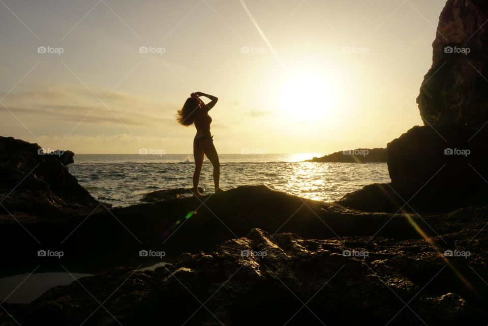 Sunrise#rocks#sea#human#pose