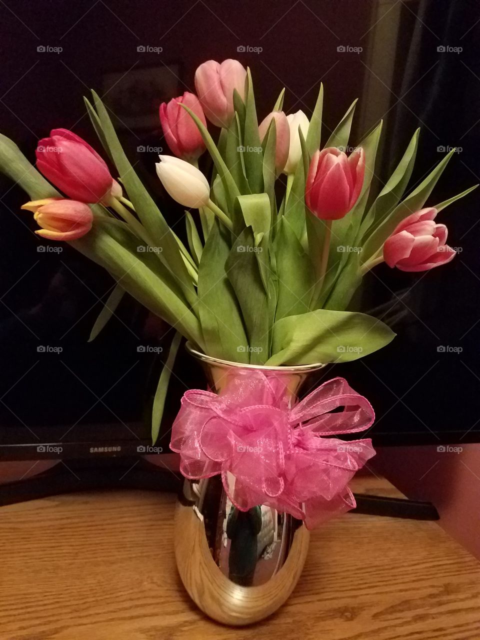 Tulips  with  a pink bow