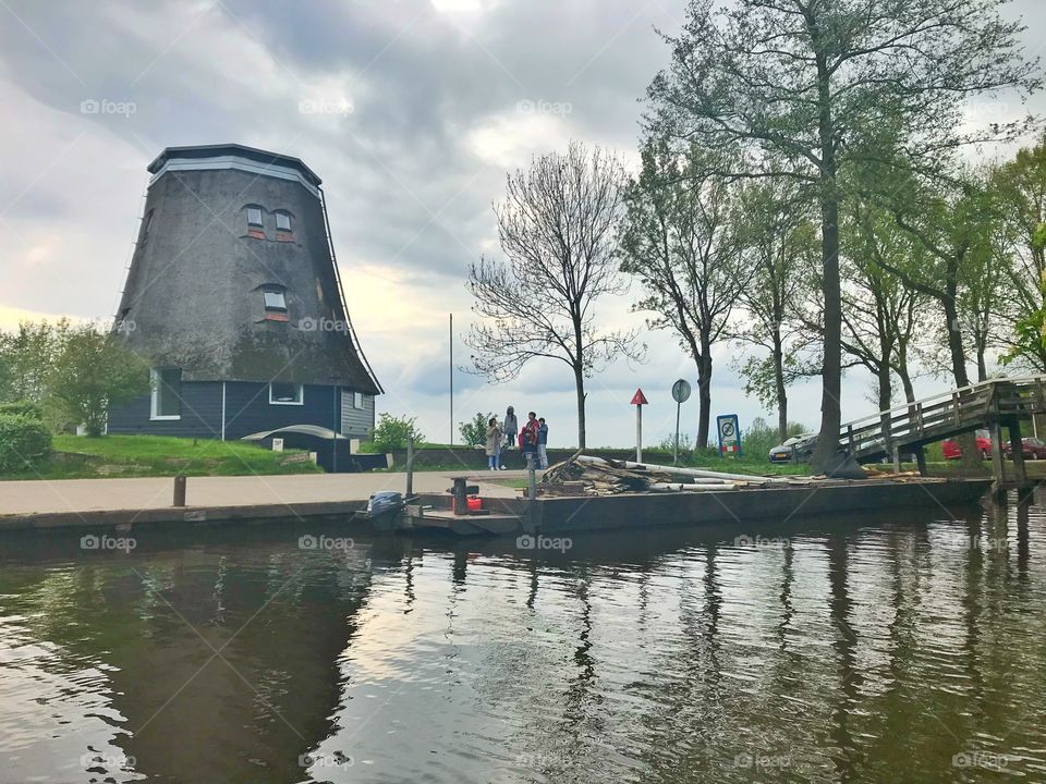 Water canal and a house in Giethoorn, Netherlands 