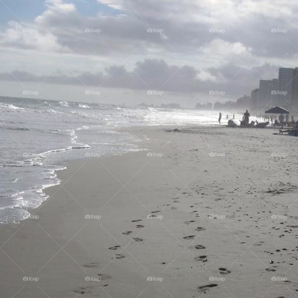 Foot prints in the sand