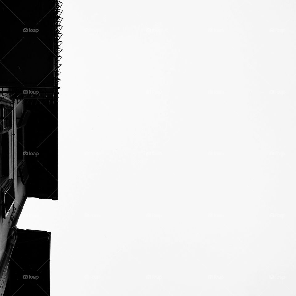 Slice of building in white sky