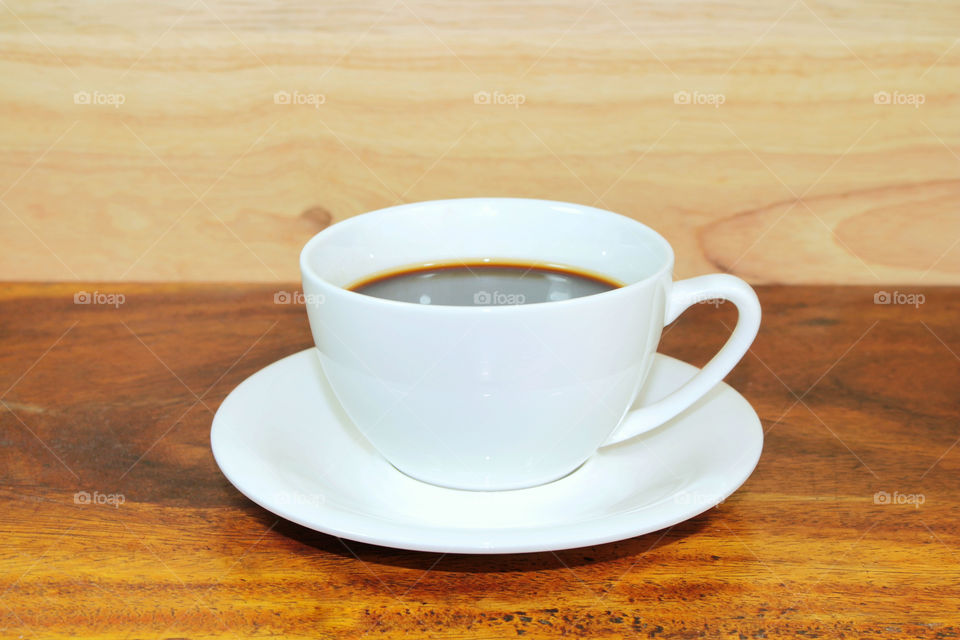 Close up white coffee cup No smoke on wooden background in studio