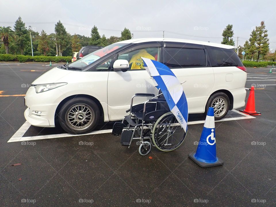 Handicap parking lot and wheel chair