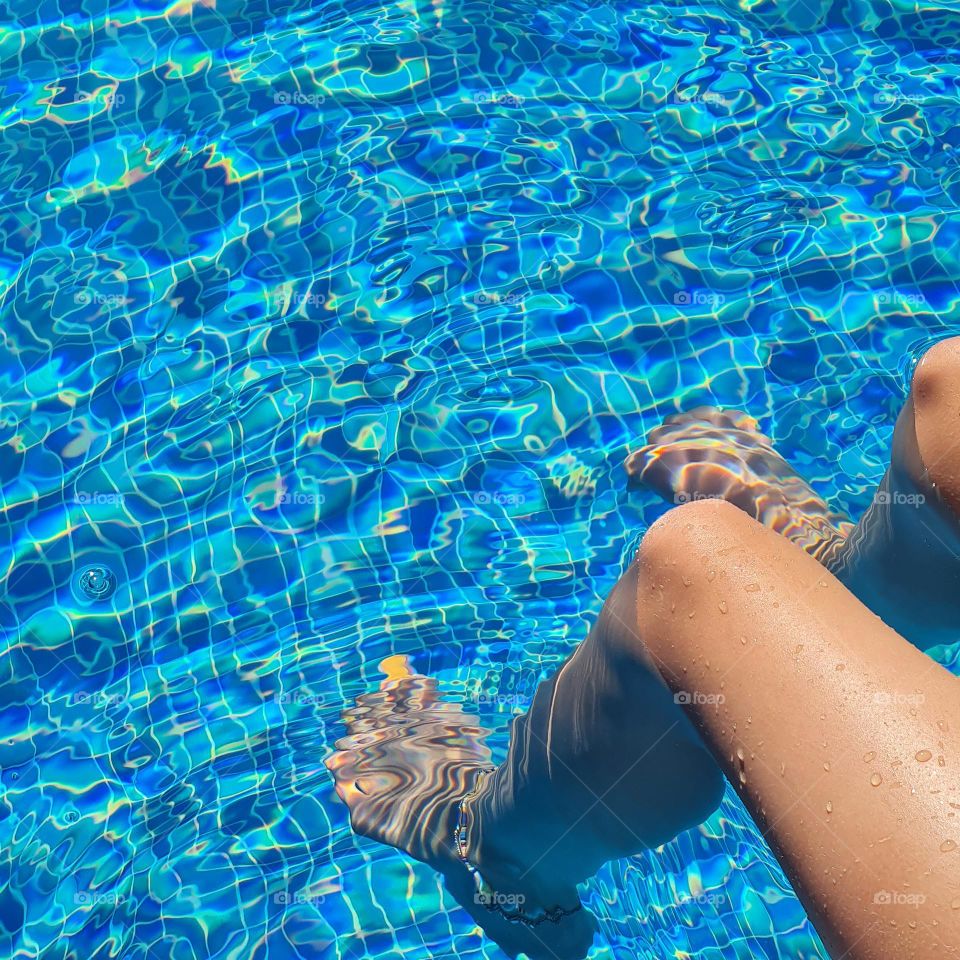 Refreshing Dip in a Crystal Clear Pool