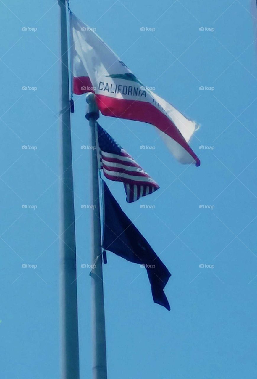 California, American, and POW Flags