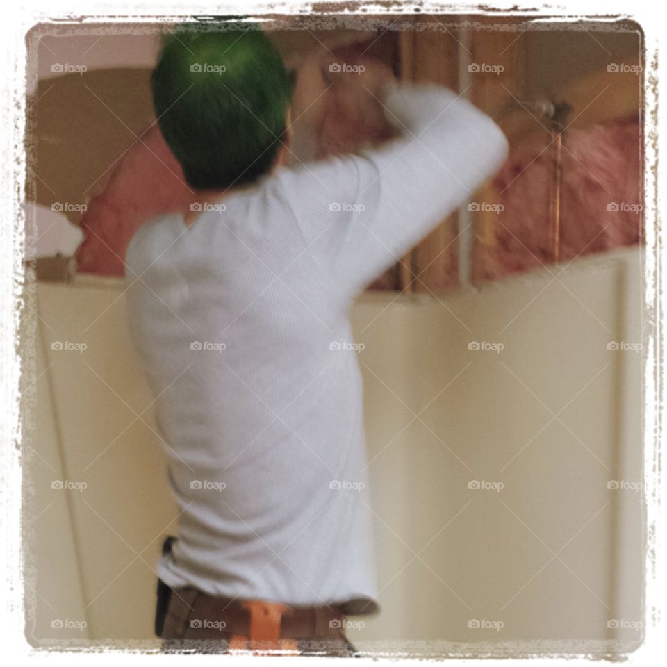 working. my husband working on our bathroom