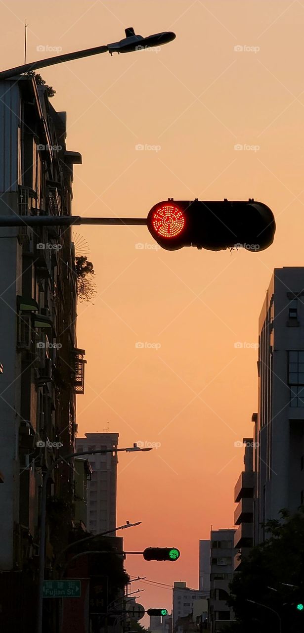 Taiwan street scene, sunset, clouds and traffic lights