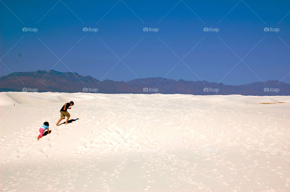 white sands new mexico boy mountains by refocusphoto