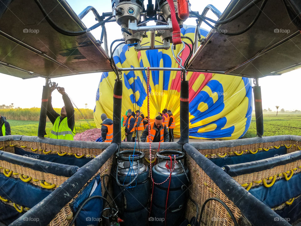 Balloon staff team are trying to control balloon down