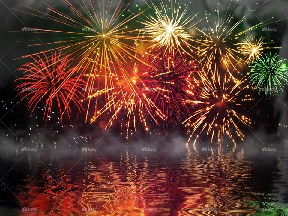 Fireworks reflected on water. Fireworks reflected on water
