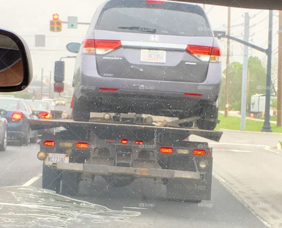 Minivan a out to fall


