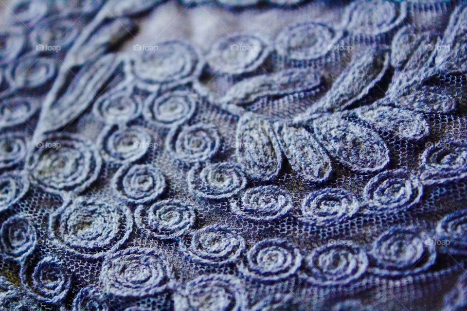 Creative Textures - blue embroidered design in netting over fabric