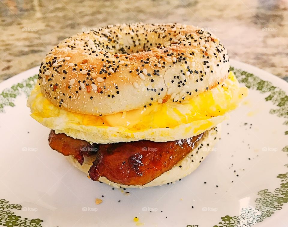 Breakfast sandwich! Italian sausage and egg on everything bagel 