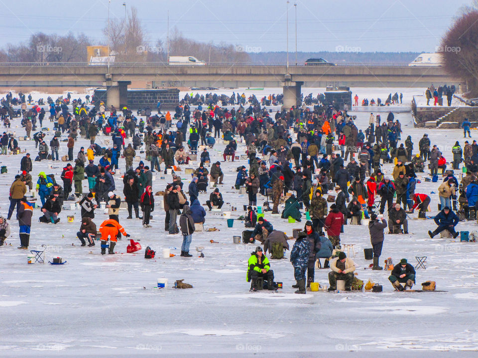 very many winter anglers on the harbor ice channel