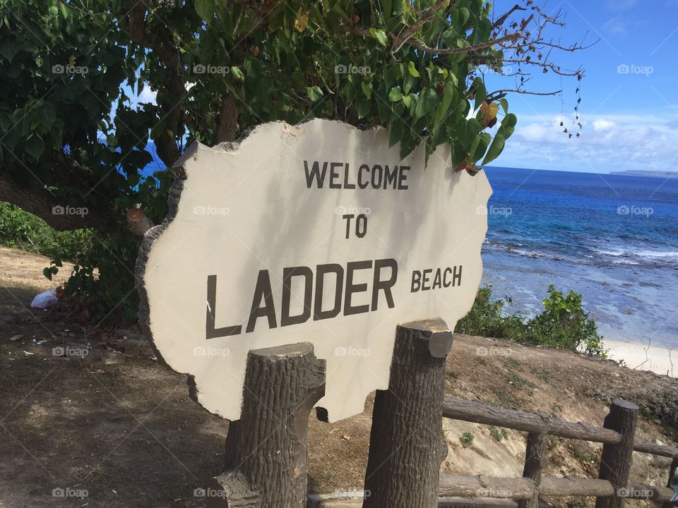 Image of the sign at then enter acne to Ladder Beach, on the southern side of Guam.