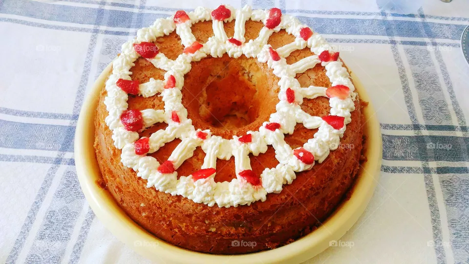 Homemade babà bimby birthday cake with strawberries and milk cream