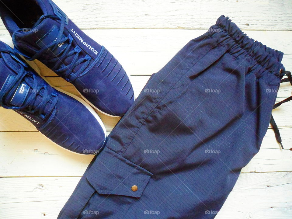 blue sport sneakers firm adidas and cargo pants firm Rextim