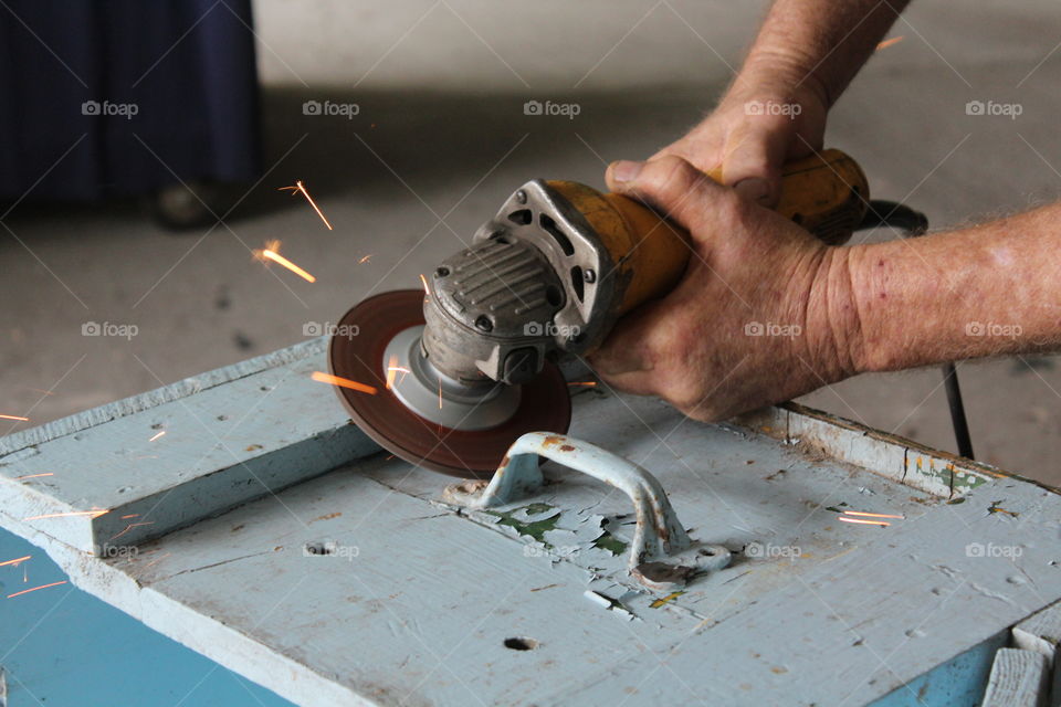 Close-up of electric wheel grinder