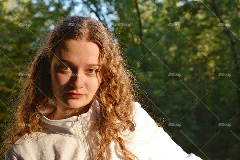 young girl beautiful portrait in sunlight