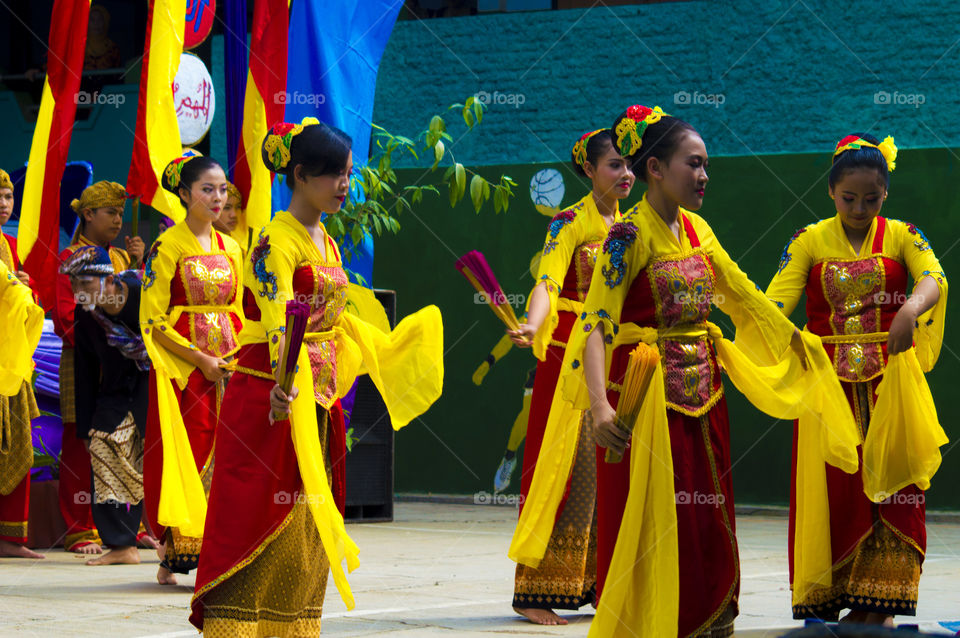 Group of dancers performing on stage