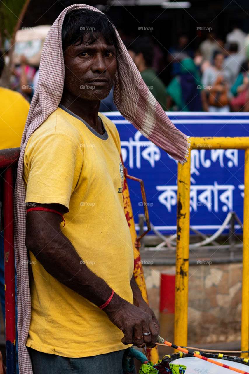 Dhakis (Bengali: ঢাকি) are traditional drummers who play the dhak (drum) during Hindu festivals, primarily in Bengal. Drum beats are an integral part of the five-day-long annual festivities associated with Durga Puja.
