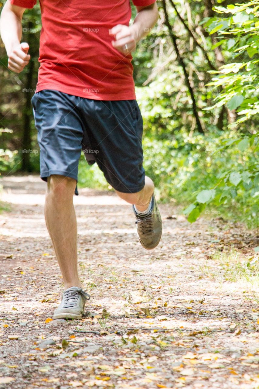 Man running on the footpath