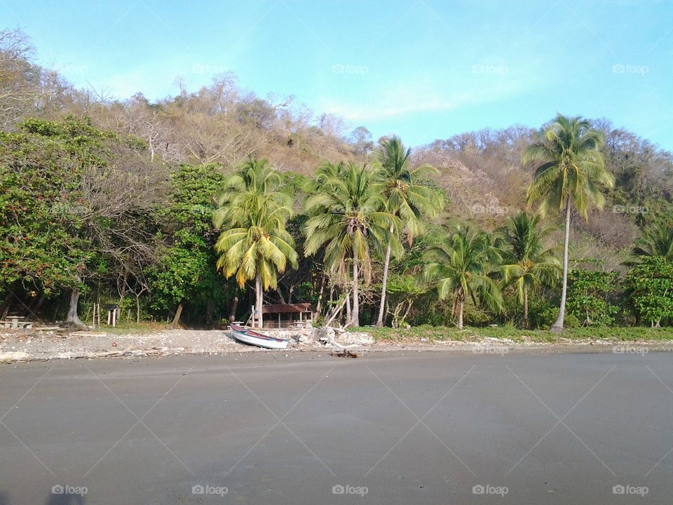 deserted beach . a deserted beach in costa rica