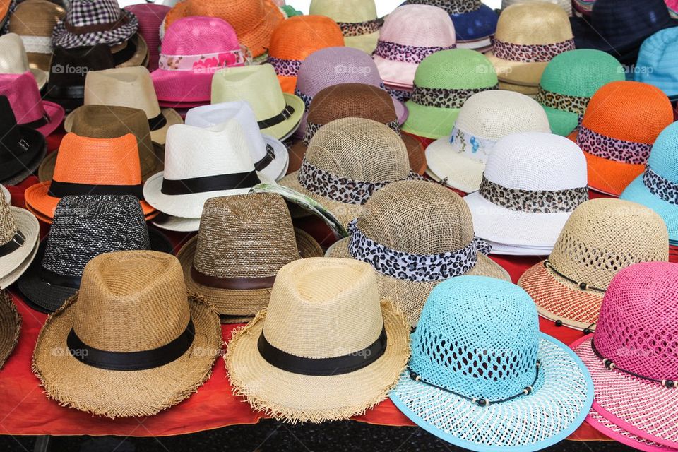 Straw hats for sale in market