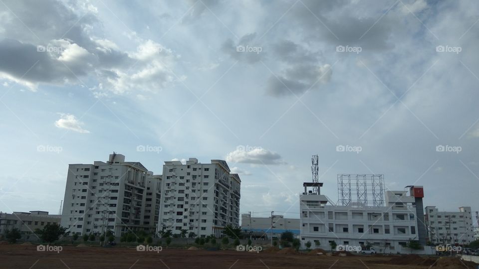 lovely clouds with BIG Buldings