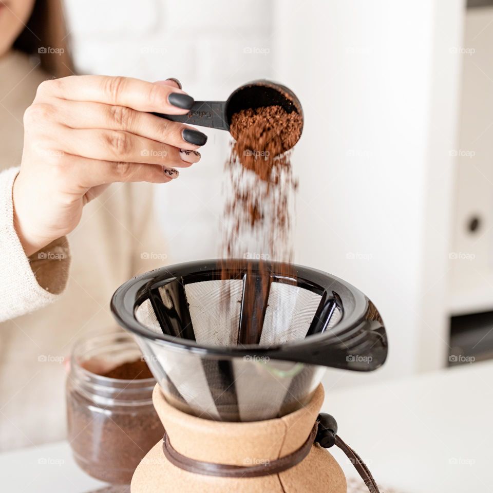 woman making coffee