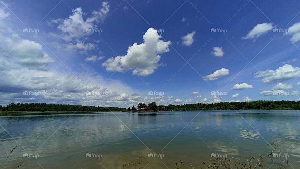 beautiful blue sky clouds nature landscape lake shore summer time