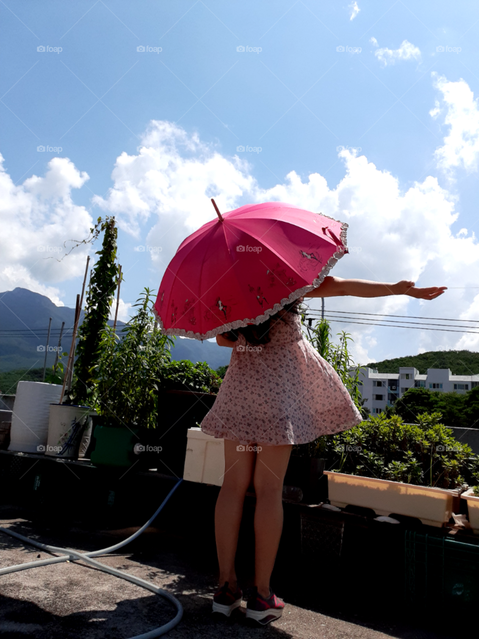 my favorate and memorable old pink umbrella, old pink  dress and old pink rubber shoes  with this beautiful  summer day.