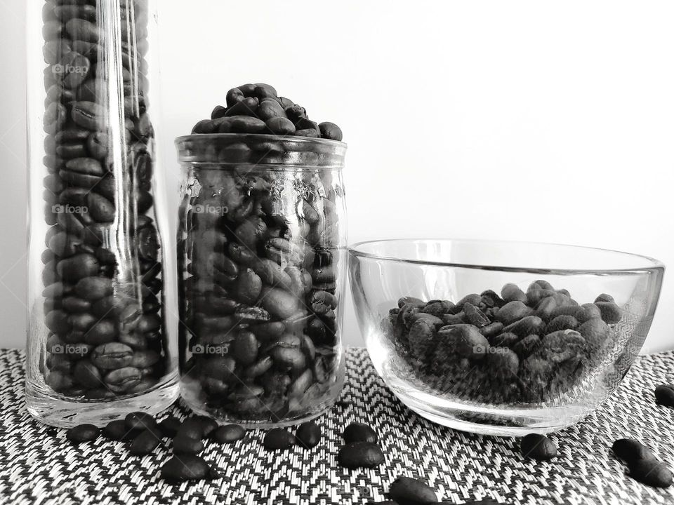 Coffee beans in glass in black and white.