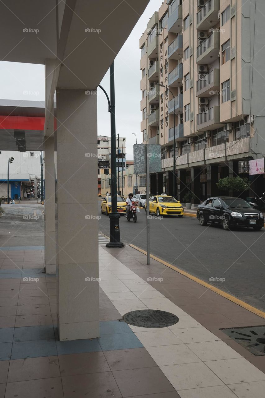 Streets of the city of machala in ecuador, road and automobiles