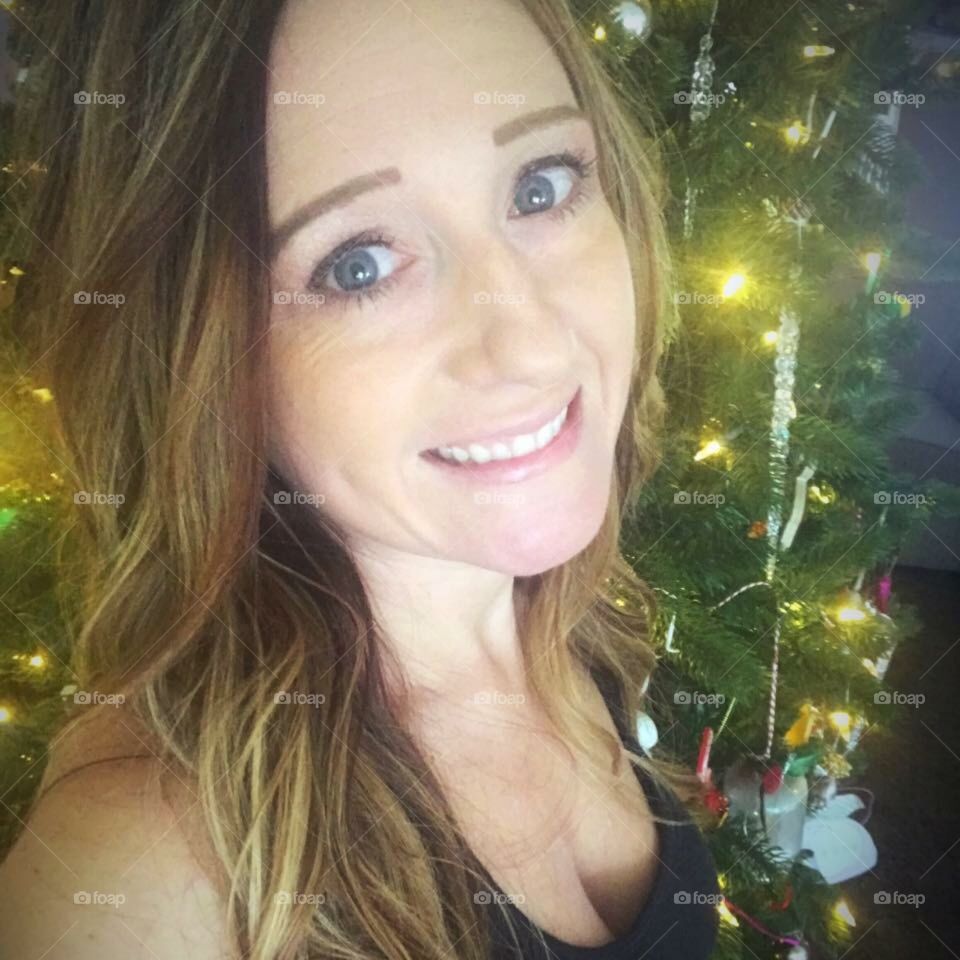 Nothing makes a face light up like the magic of a Christmas tree adorned with shiny ornaments. 
