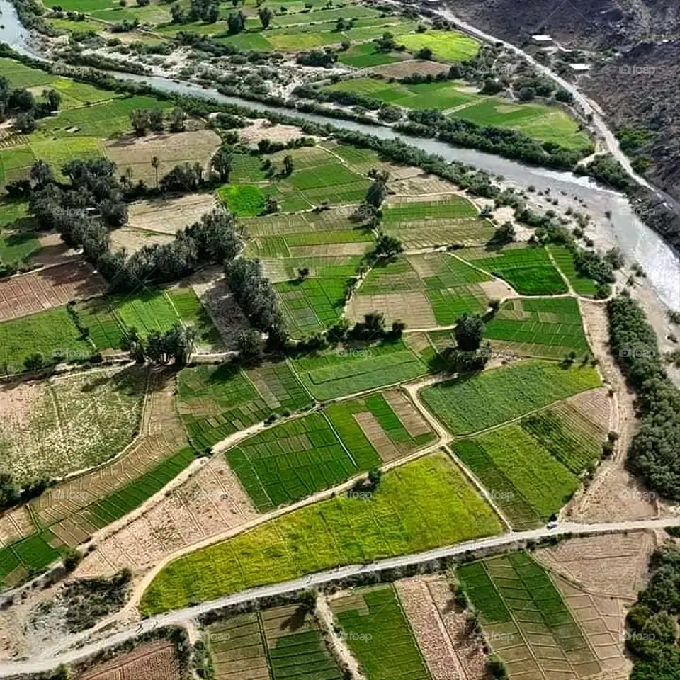 Glory be to God, the magnificent and picturesque view and the natural green trees are a view that is nothing more wonderful than it