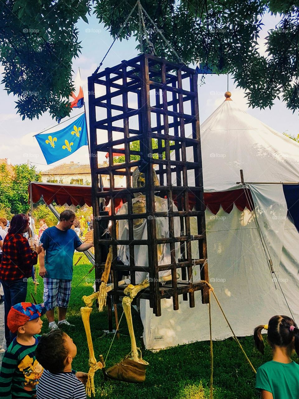 medieval prisoner in an iron cage