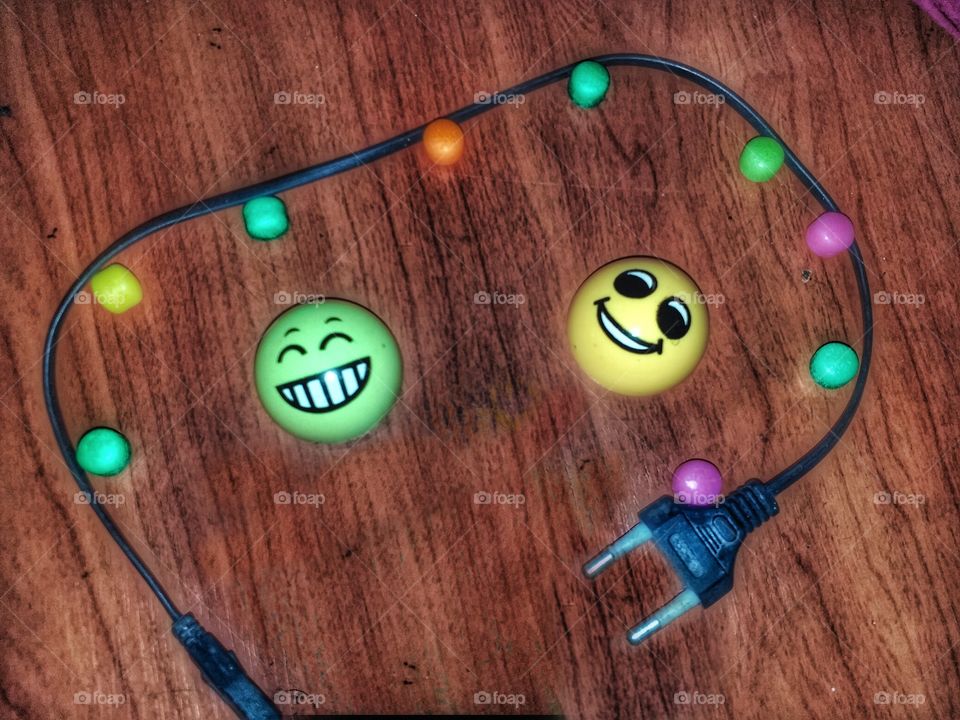 plugin with smile faces and colourful sweets