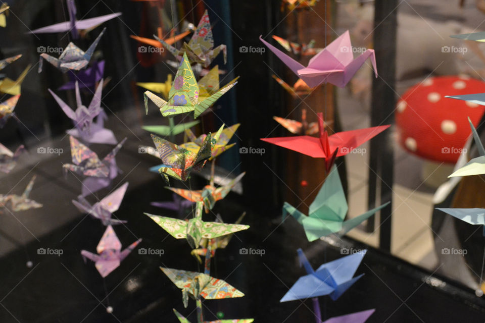 origami Cranes in window. Origami Cranes in a window