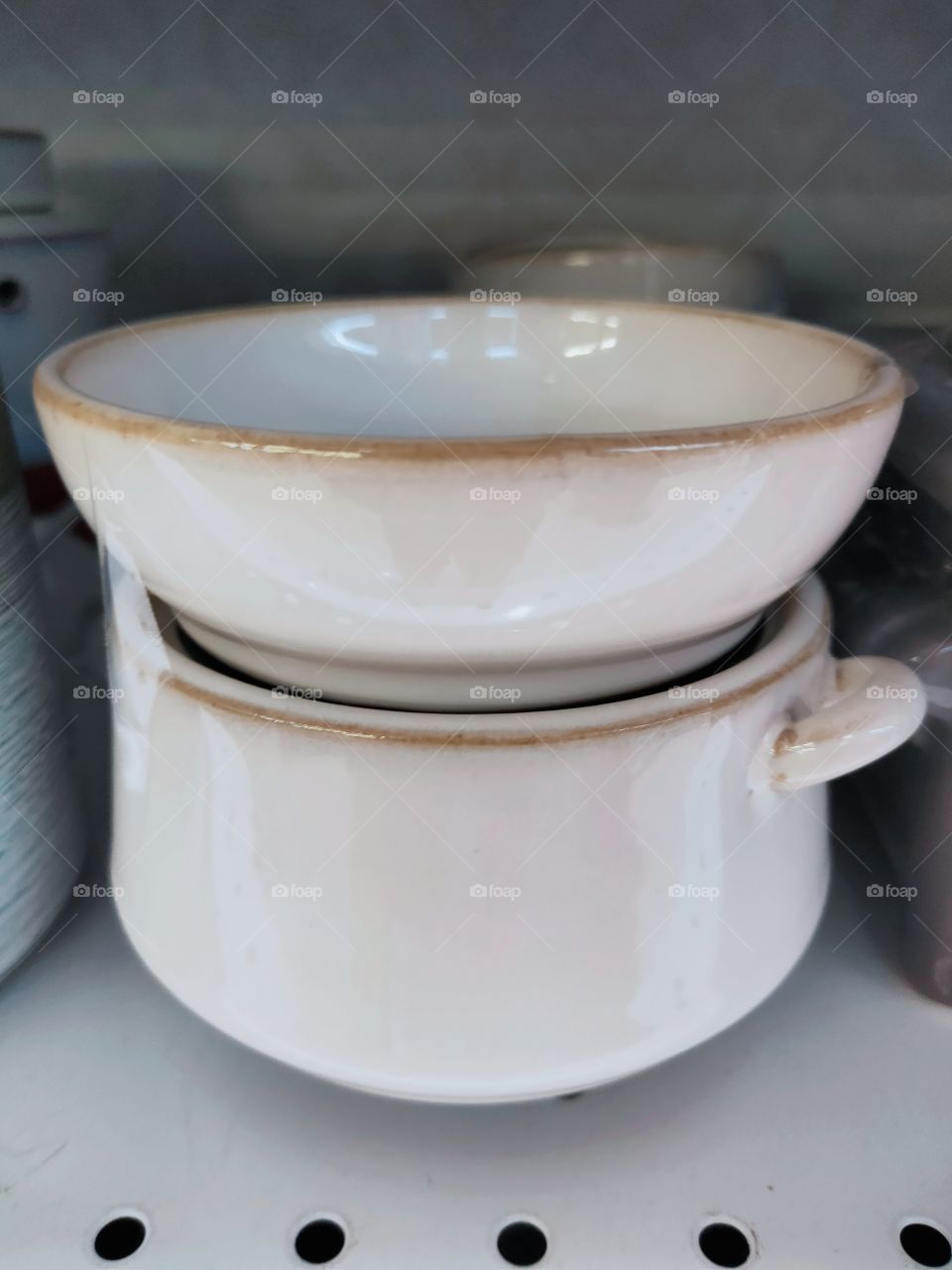 glasses and bowls that are plain white with a yellow stripe on them. glass made of selected ceramic