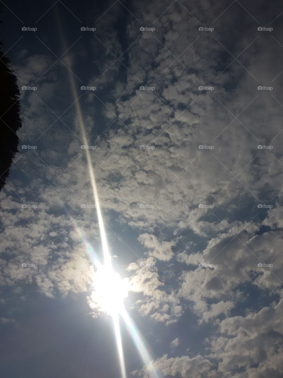 sunrays on the beach in greece