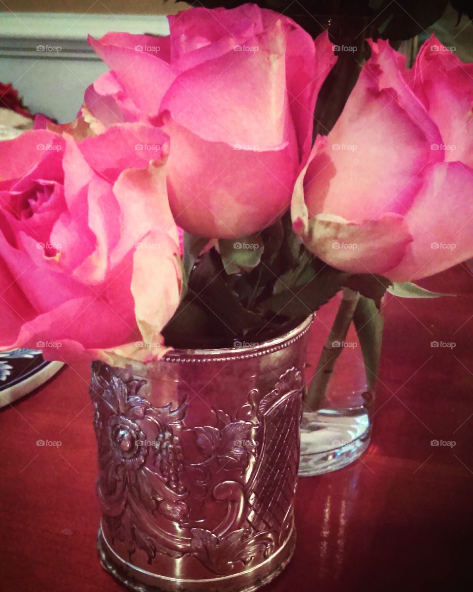 Roses in silver cup