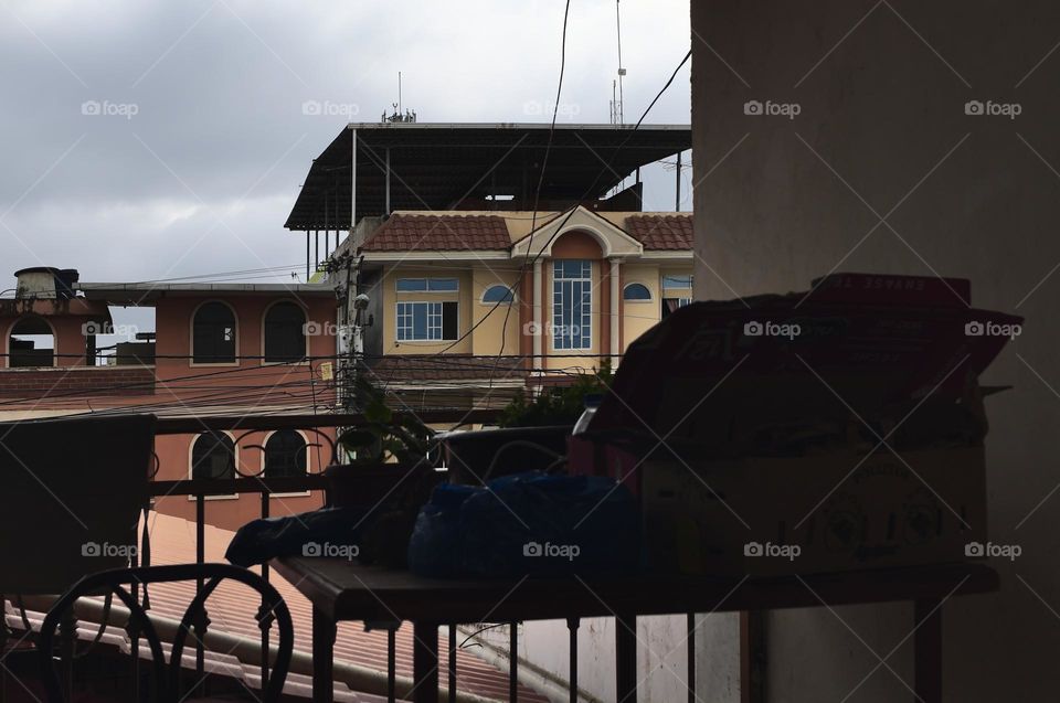 View of the house from an adjacent balcony in town