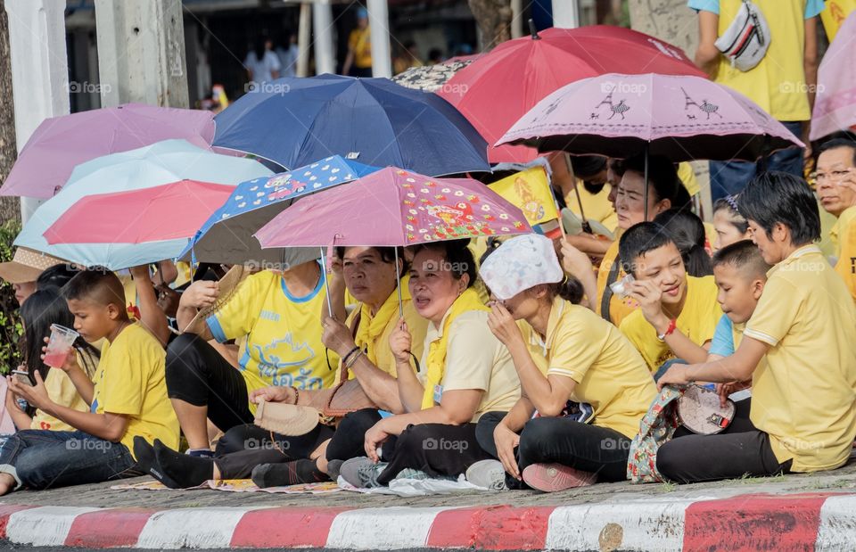 Thai people wait to see their King  