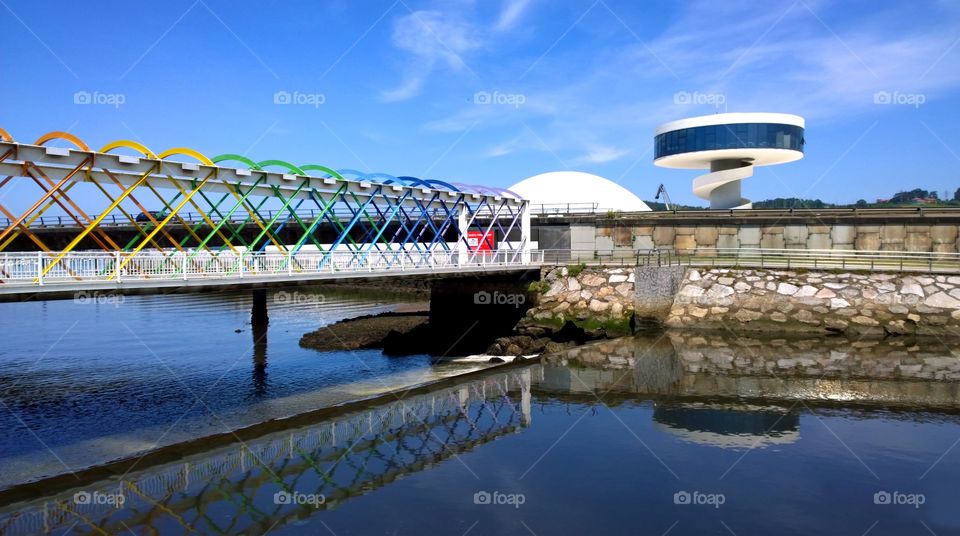 Niemeyer Center in Aviles. View of the colorful bridge to the Niemeyer Center building in Aviles, Spain designed by Oscar Niemeyer